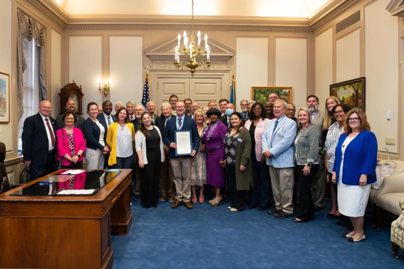 Delaware local officials gathered May 13 in the office of Gov. Matt Meyer for Delaware Local Government Day, an annual celebration organized by the Delaware League of Local Governments and hosted by the Lieutenant Governor’s Office. DLLG Executive Director Dr. Kevin J. Spence, center, holds a signed proclamation of the day from Gov. Matt Meyer.